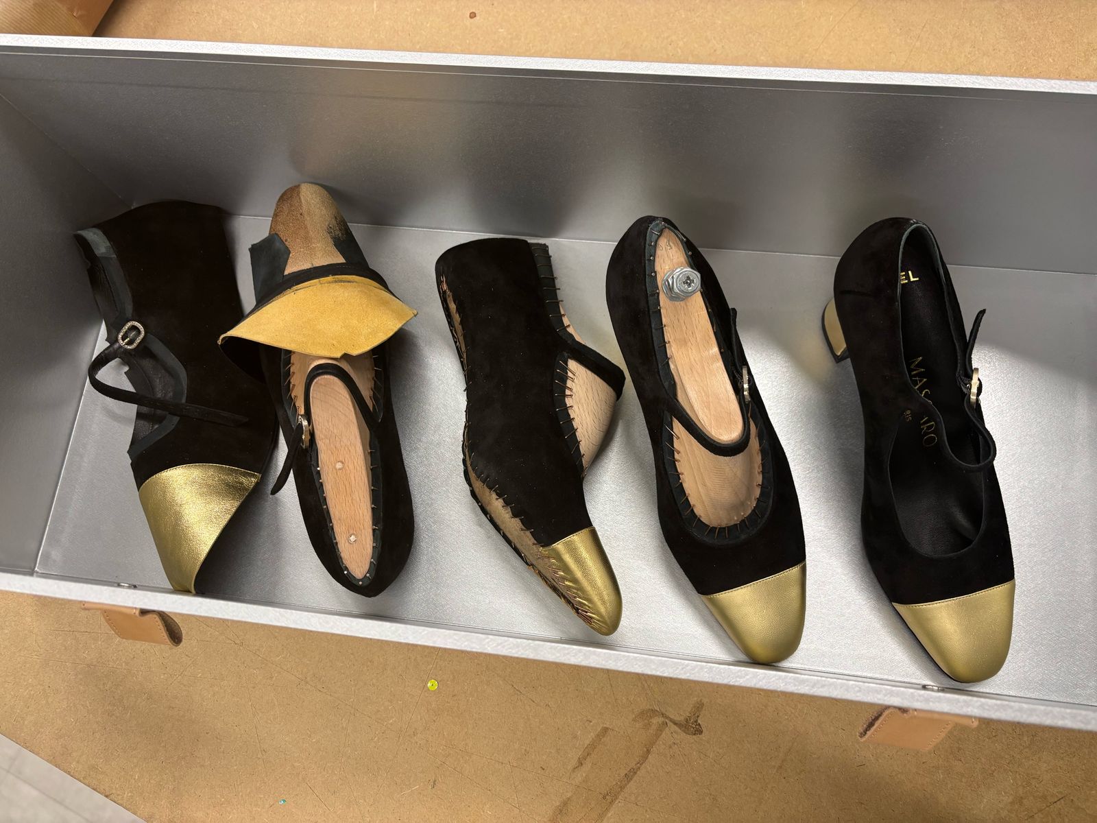 Massaro — bespoke shoes lined up on the bench