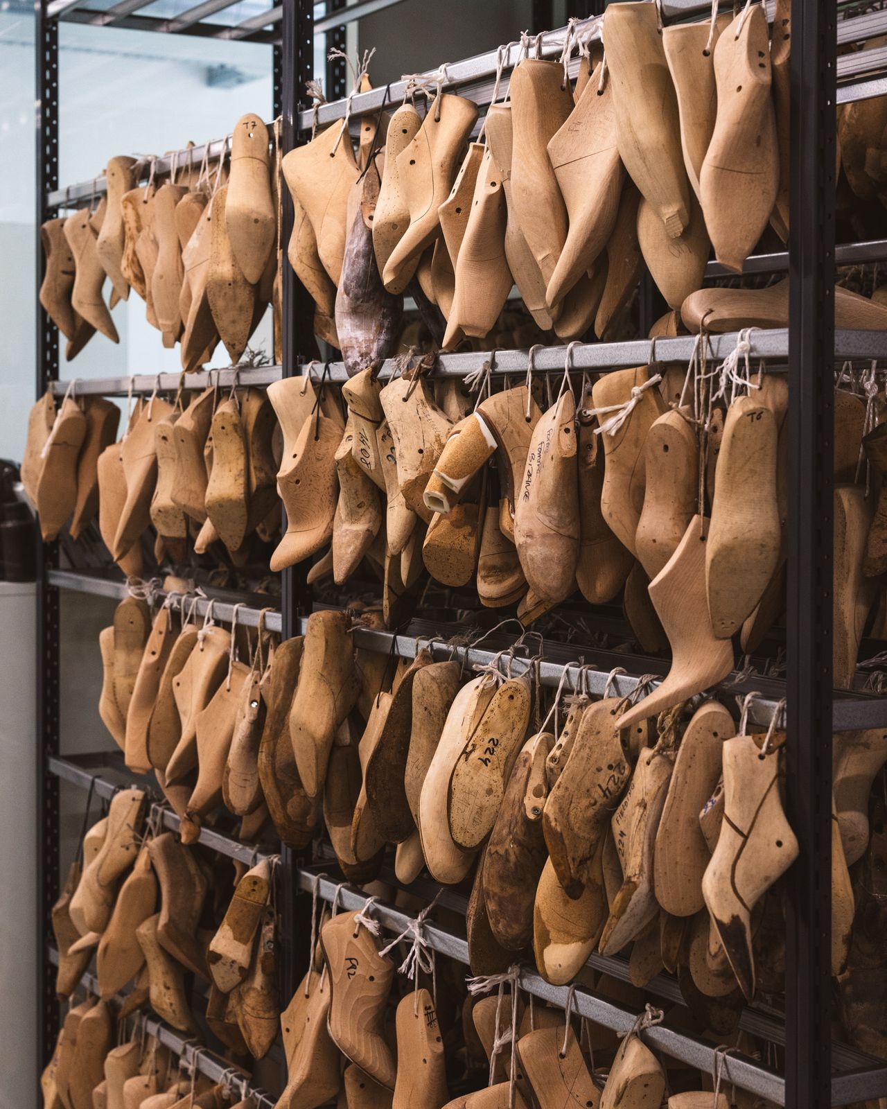 Massaro — the archive wall of more than 6,000 pairs of wooden lasts